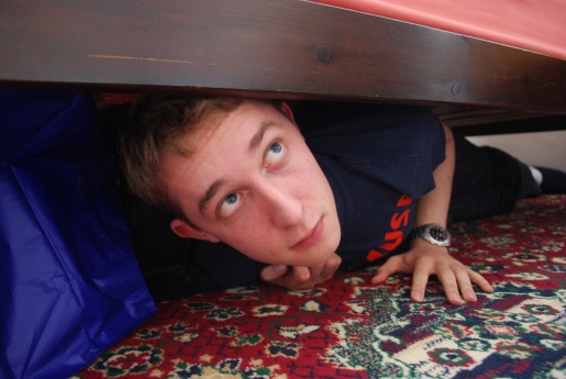man-hiding-under-bed.jpg